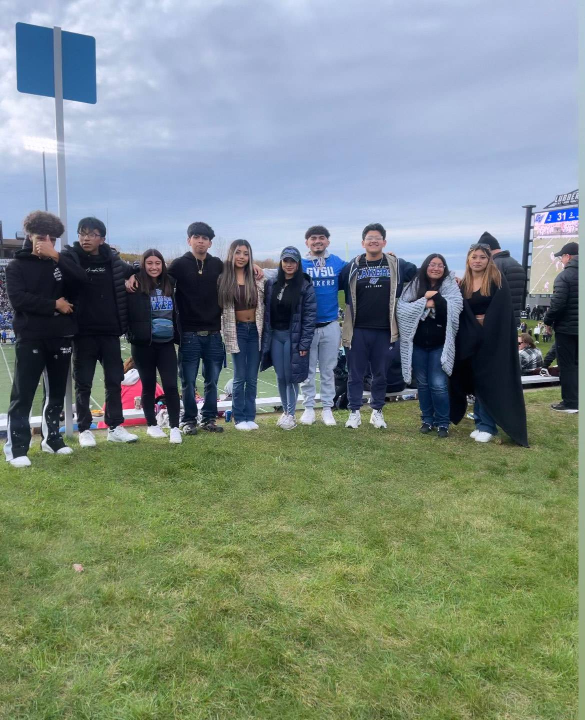 students at a GVSU football game